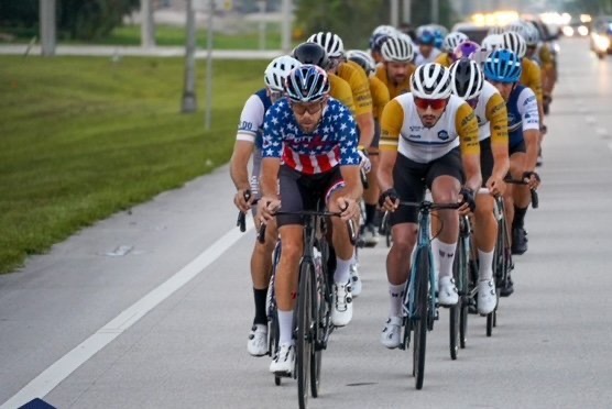 Police-escorted elite paceline on a Jacksonville highway during a Sub 4 century.
